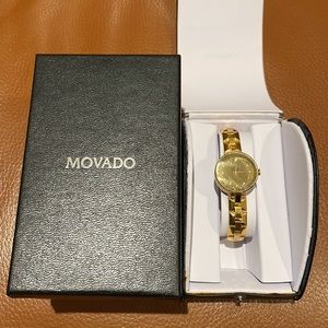 Movado Gold "Diamond Mirror Face" Ladies Watch. Movado